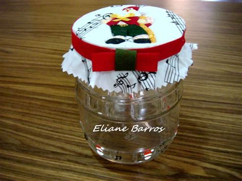 A Glass Jar With Musical Notes And A Red Ribbon Around The Lid On A