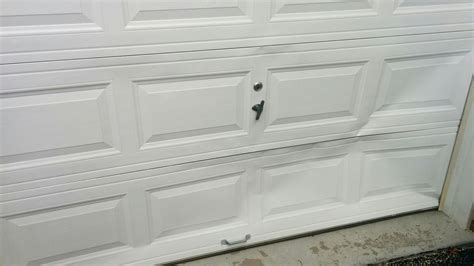 How To Fix A Bent Garage Door Storables