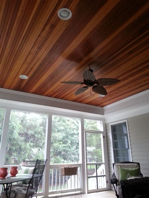 Great screened in porch with a tray ceiling and redwood tongue and ...