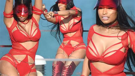 Nicki Minaj Flaunts Unreal Curves In Red Cutout Swimsuit As She Films