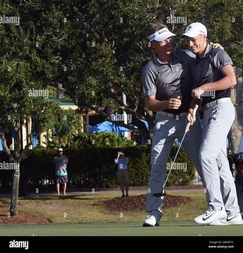 Bernhard Langer Hugs His Son Jason After Jason Sunk The Final Putt To