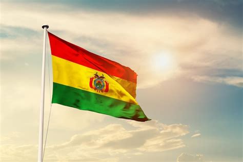 Premium Photo Bolivia National Flag Waving In Beautiful Sky