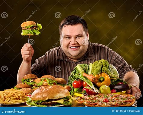 Diet Fat Man Makes Choice Between Healthy And Unhealthy Food Stock Image Image Of Restaurant