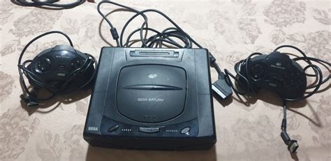 Sega saturn dois comandos e cabos São Vicente OLX Portugal