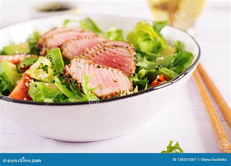 Japanese Traditional Salad With Pieces Of Medium Rare Grilled Ahi Tuna