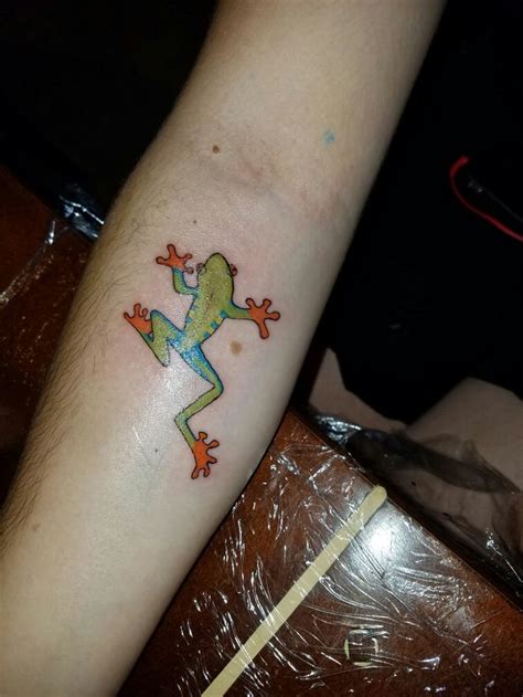 Colorful Tree Frog Arm Tattoo