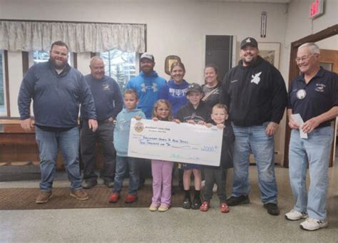 Brockport Lions Presents Check To Brockport Hamlin Jr Blue Devils