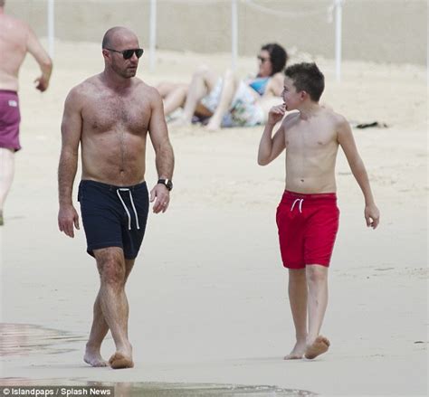 Alan Shearer Goes Shirtless On Beach To Reveal Buff Body Play Father