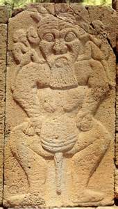 An Ancient Carving On The Side Of A Stone Wall In Mexico Depicting A