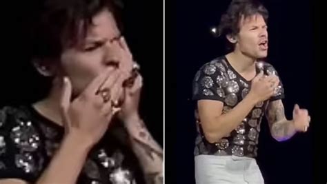 Harry Styles Doubles Over In Agony As Fan Hurls Skittle At His Eye