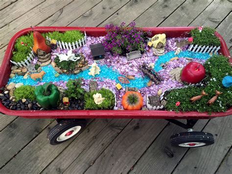 Sweet Fairy Garden In A Radio Flyer Wagon Fairy Garden Diy Fairy