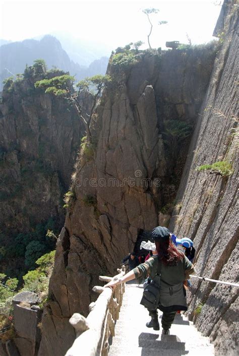 Huangshan Mountain In Anhui Province China Walking Down A Steep Path