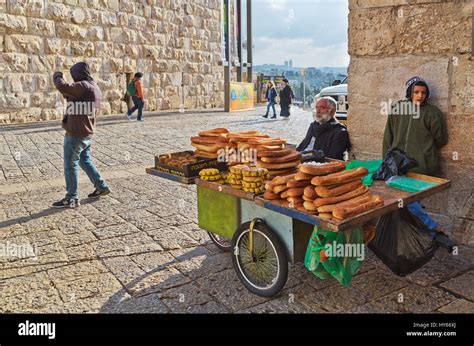 JERUSALEM ISRAEL DECEMBER 26 2016 Street Vendor Sells Bagel Bread