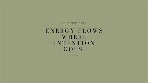 The Words Energy Flows Where Intention Goes Are Written In Black On A