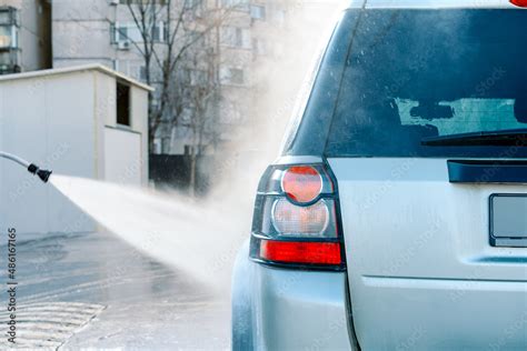 Car wash with pressure washer Stock Photo | Adobe Stock