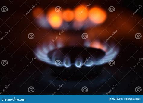 Natural Gas Burning A Blue Flames On Black Background Stock Image