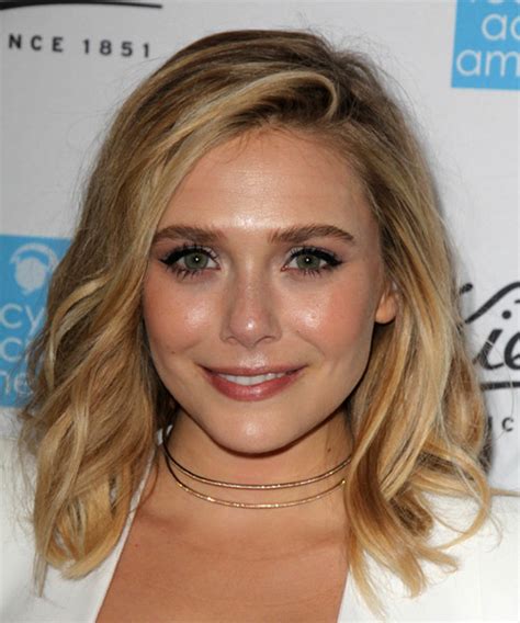 Elizabeth Olsen Medium Wavy Dark Blonde Hairstyle