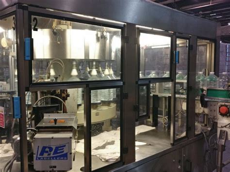 Used P E LABELLERS Rotary Cut Stack Hot Melt Glue Labeler Sourceline Machinery