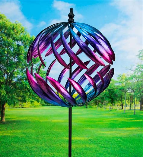 You Cant Miss This Oversized Split Sphere Metal Wind Spinner With Its