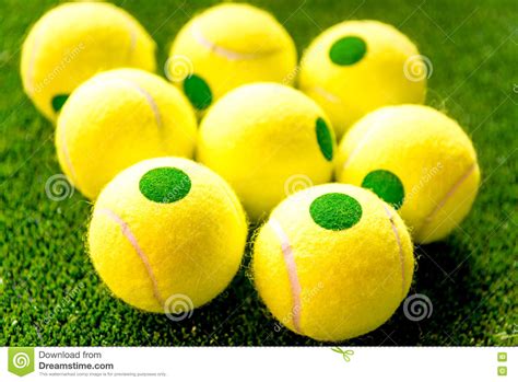 Tennis Ball on Green Background Close Up Stock Photo - Image of ...