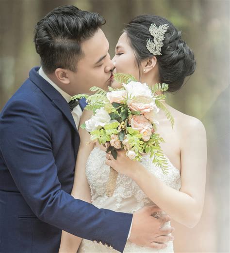 Women's White Floral Wedding Gown · Free Stock Photo