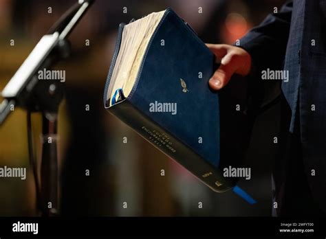 DRIPPING SPRINGS TEXAS FEBRUARY 1 A Speaker Holds A Bible Whiule