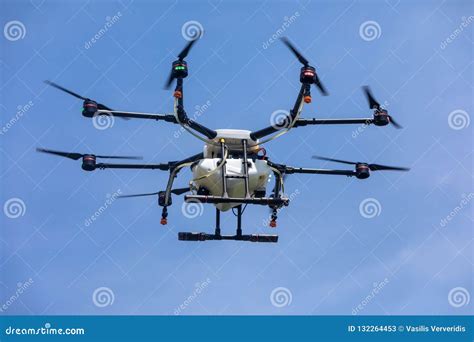 Professional Agriculture Drone on the Green Field during the Tes ...