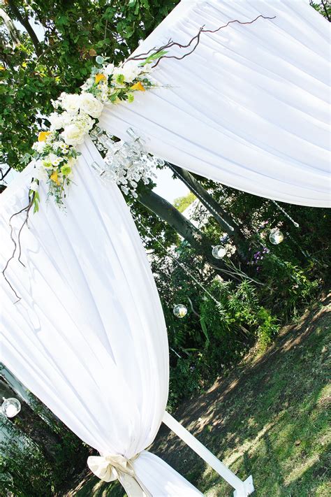 Wedding Arch With Crystal Chandelier And Hanging Crystal And Floral