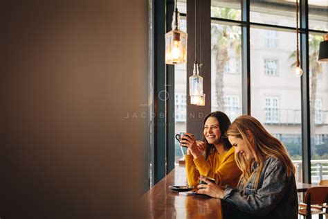 Friends Chatting While Drinking Coffee Jacob Lund Photography Store