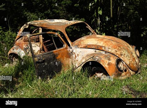 Abandoned rusty old VW Beetle car Stock Photo - Alamy