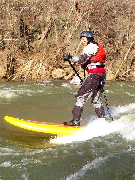 Demystifying the Adventure: River Surfing on a Paddle Board