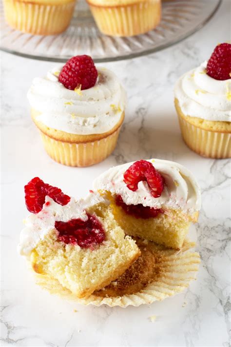 Lemon Raspberry Filled Cupcakes With White Chocolate Buttercream Frosting Cake N Knife