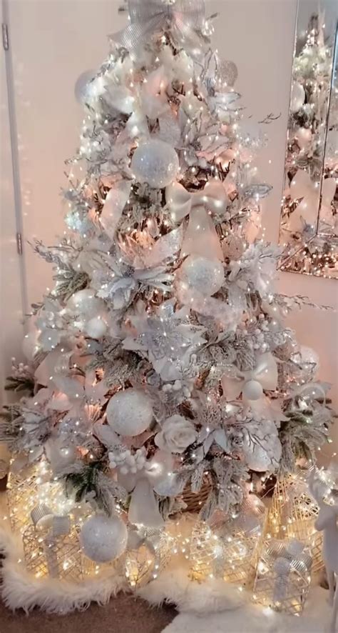 Elegant White Christmas Tree With Silver Ornaments