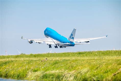 Closeup Of A Boeing KLM 747 Airplane On Take Off From The Schiphol