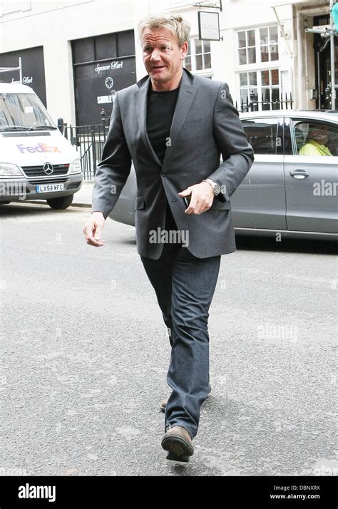 Celebrity chef Gordon Ramsay leaving Claridge's wearing a grey suit ...