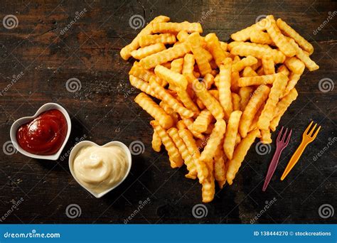 Crinkle Cut Crispy Deep Fried Pommes Frites Stock Photo Cartoondealer