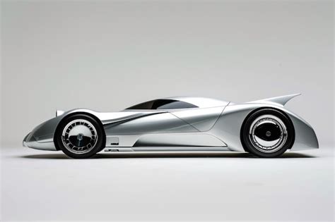 A Silver Sports Car With Black Wheels Premium AI Generated Image