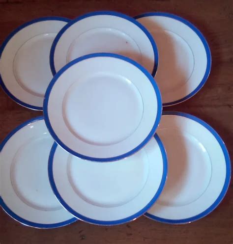 7 ASSIETTES EN Porcelaine De Limoges Liseret Bleu Et Or Betoule Et