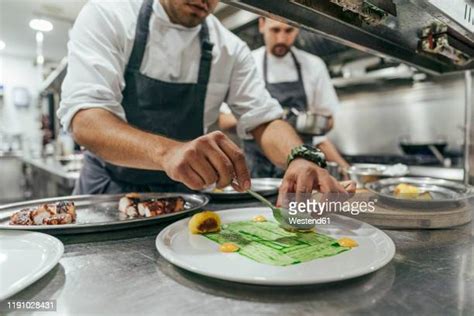 Chef Garnish Dessert Photos And Premium High Res Pictures Getty Images