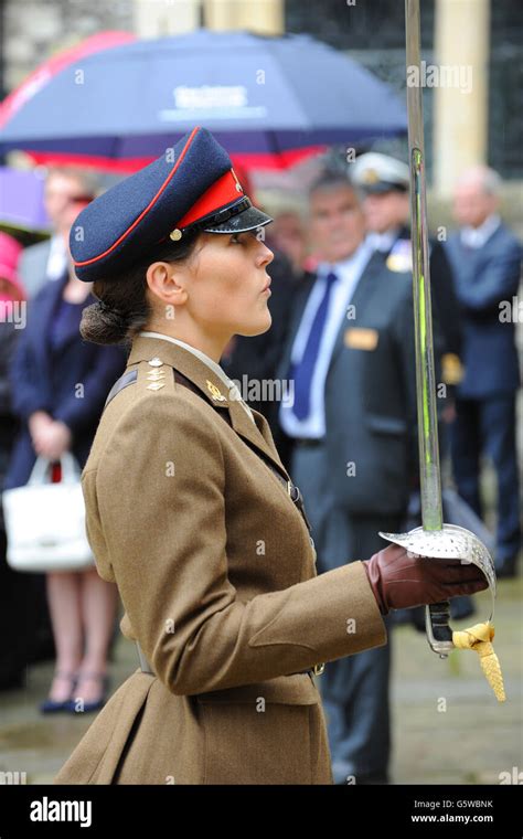 Female officer on parade with sword Stock Photo - Alamy