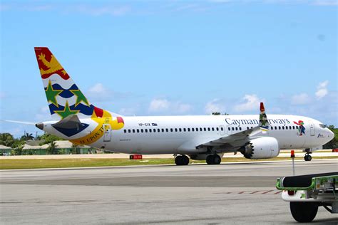 Tourists pack evacuation flights as airport closure looms - Cayman Compass