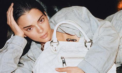 Kendall Jenner Shows Off Natural Beauty As She Hugs A Marc Jacobs Bag