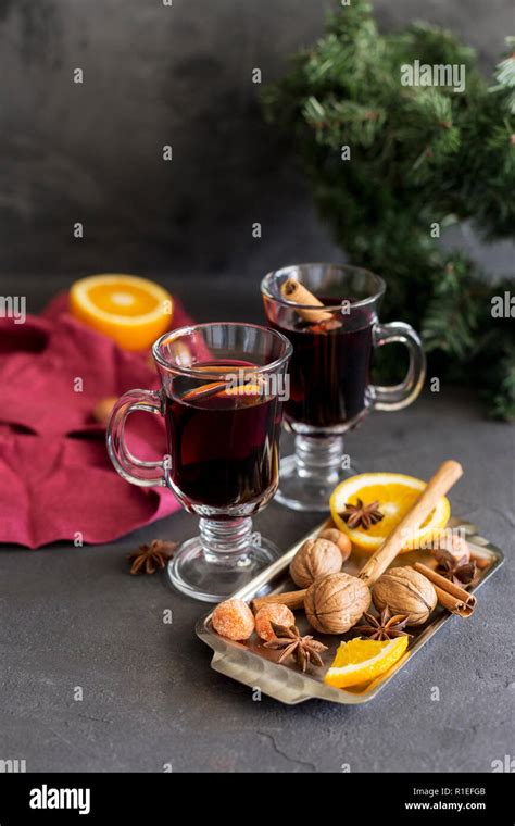 Winter Christmas Composition Red Mulled Wine In Glasses At Black