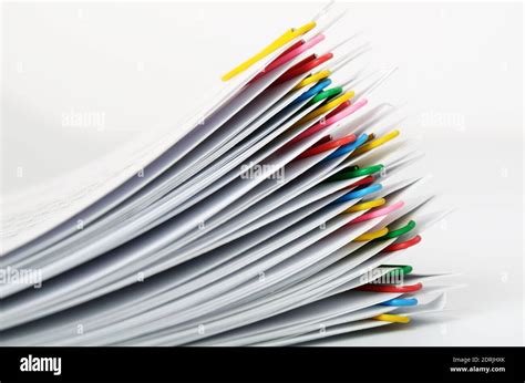 Sheets of paper stapled staples in the stack Stock Photo - Alamy