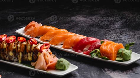 Plates filled with different types of sushi, Saki Sushi, Kraken Sushi. 20494852 Stock Photo at ...