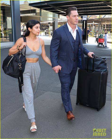 John Cena Looks Sharp In Pin Striped Suit While Arriving In Australia