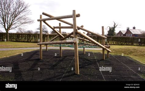 Modern climbing frame in children playground Stock Photo - Alamy