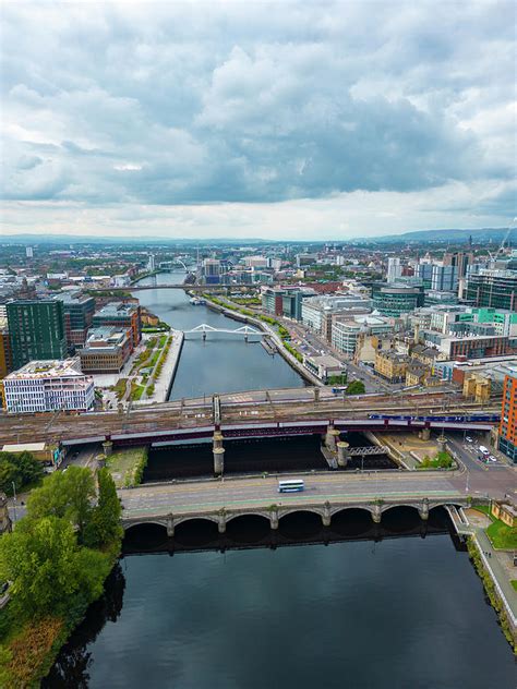 Aerial view of bridges crossing River Clyde and skyline of Glasgow ...