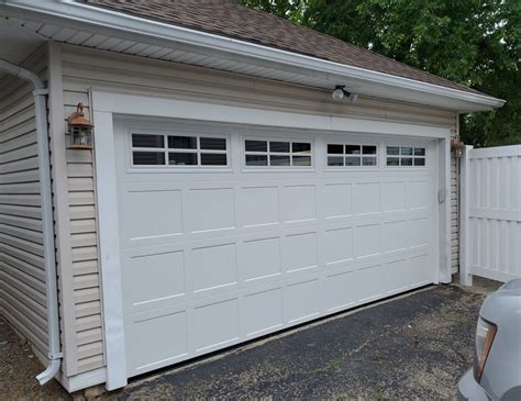 Carriage style garage doors are an awesome face lift for your home ...