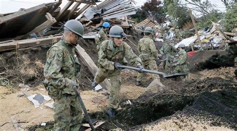 Death Toll From Japan Earthquake Rises As Rescuers Dig Through